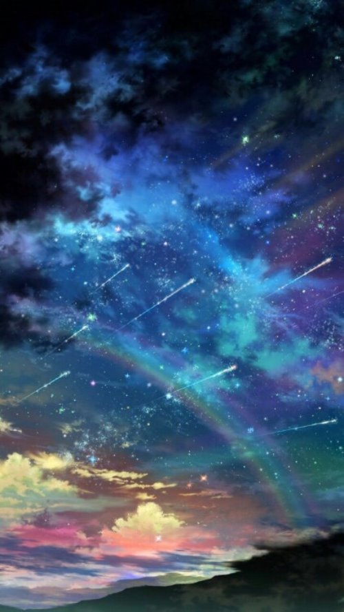 космический рисунок с звездопадом и радугой